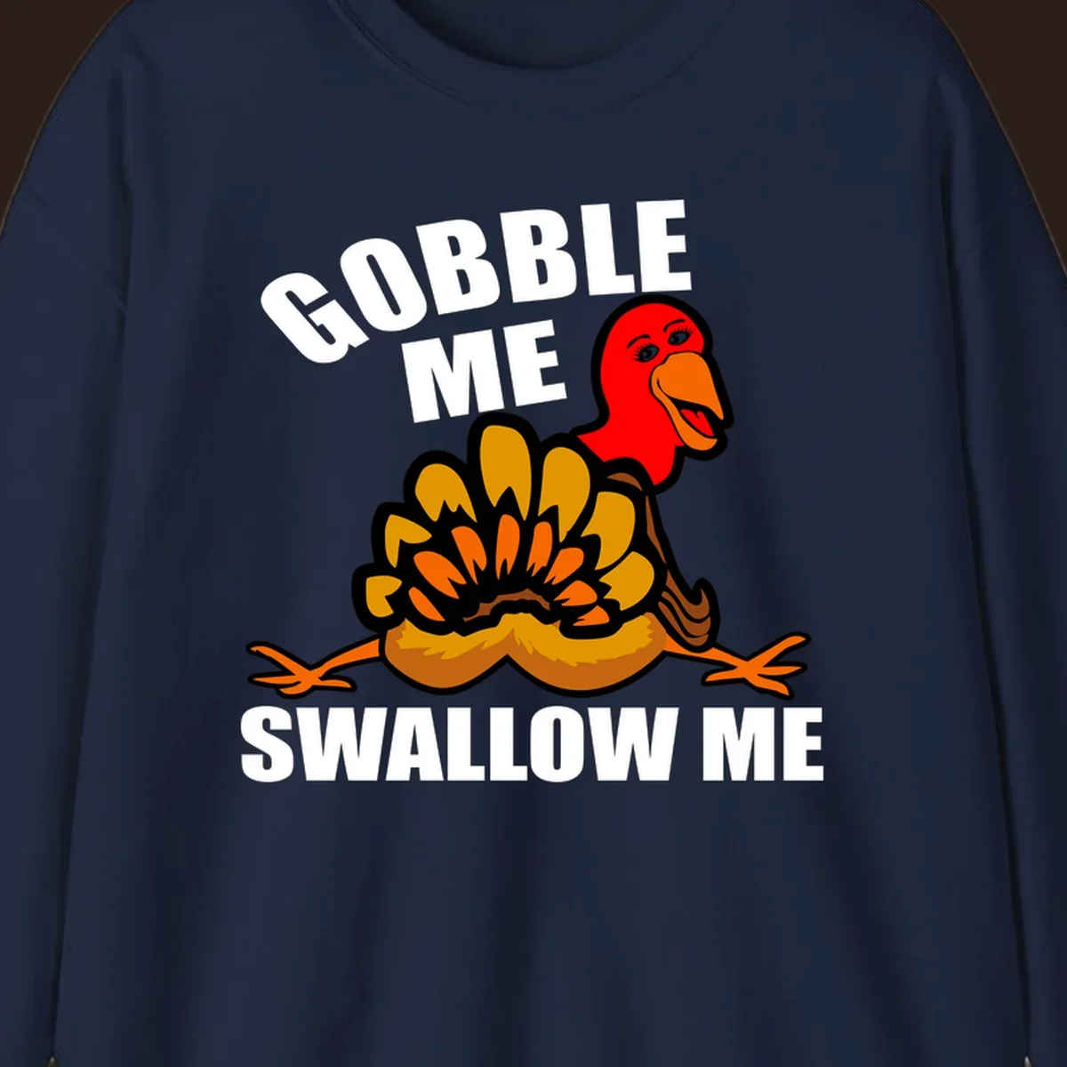 Funny Thanksgiving Gobble Me Swallow Me Turkey design with cartoon turkey and bold text.