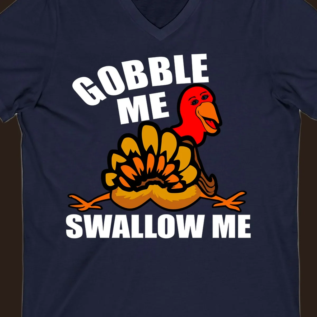 Funny Thanksgiving Gobble Me Swallow Me Turkey design with cartoon turkey and bold text.