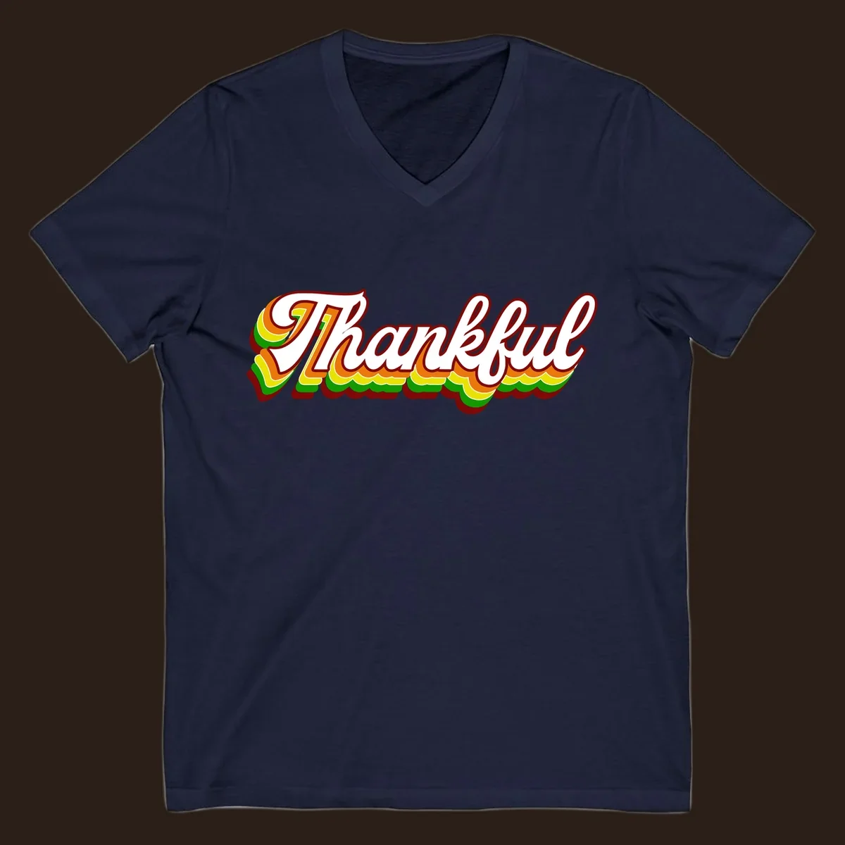 Retro thankful script text in white with colorful layered outlines and dark red shadow.