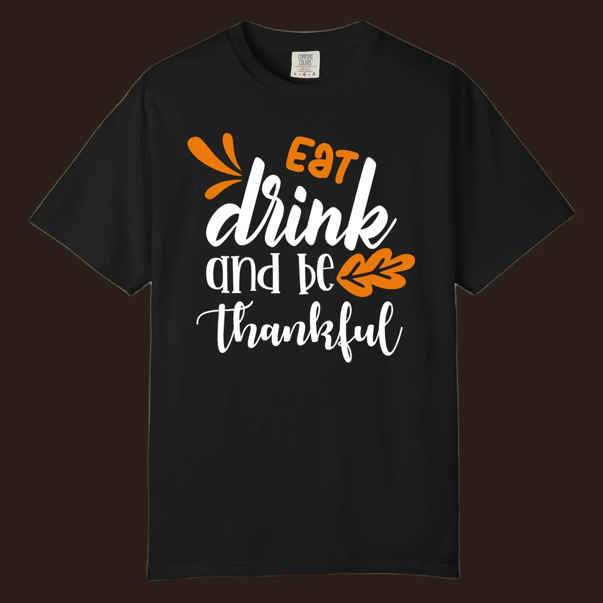 Eat Drink and Be Thankful Thanksgiving text and leaf graphic