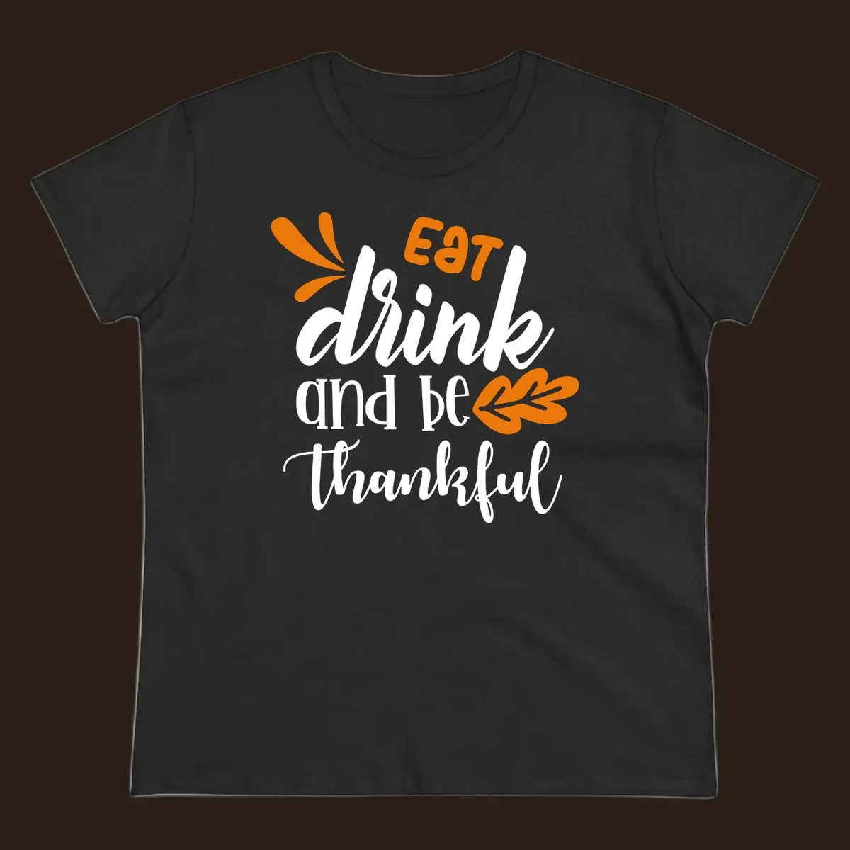 Eat Drink and Be Thankful Thanksgiving text and leaf graphic