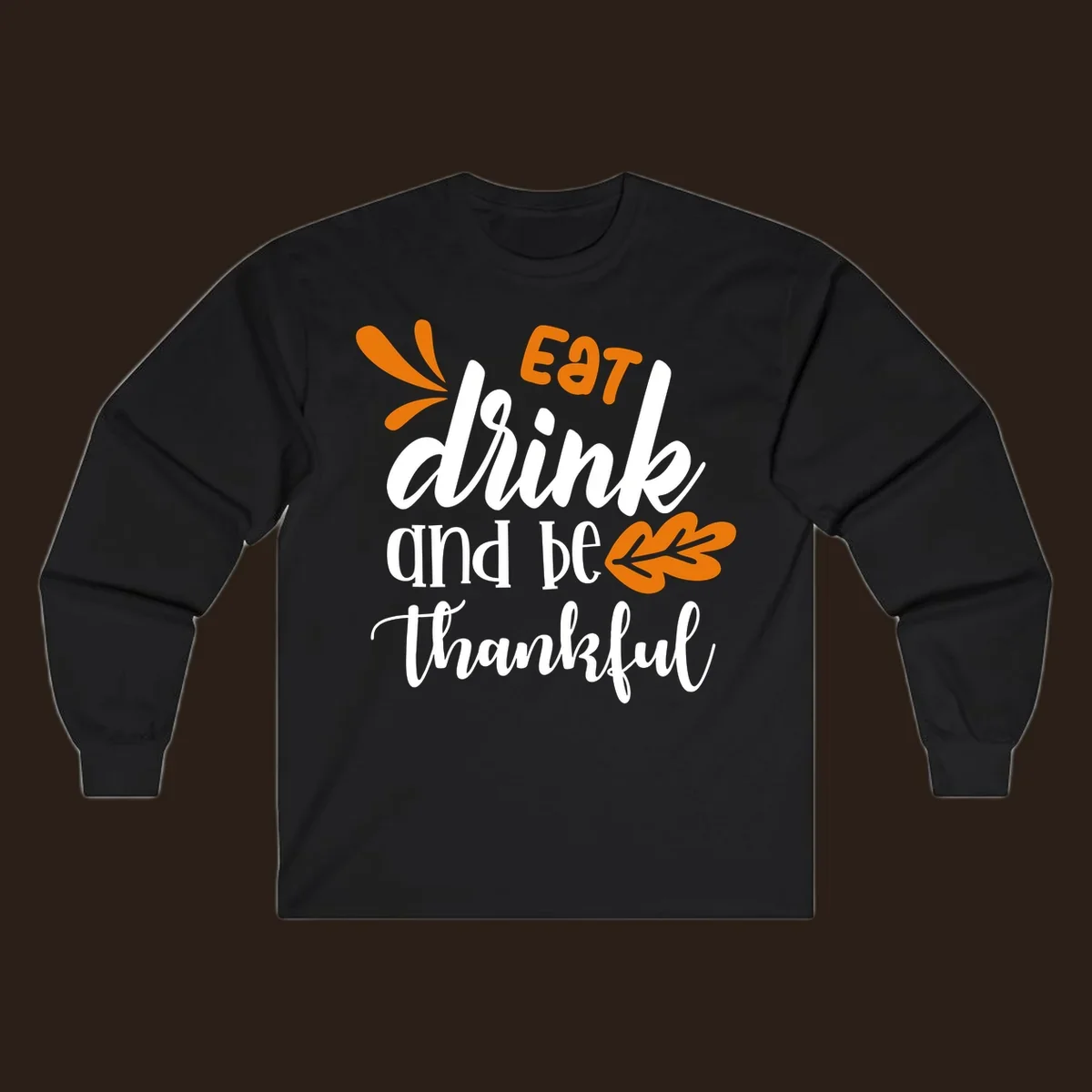Eat Drink and Be Thankful Thanksgiving text and leaf graphic