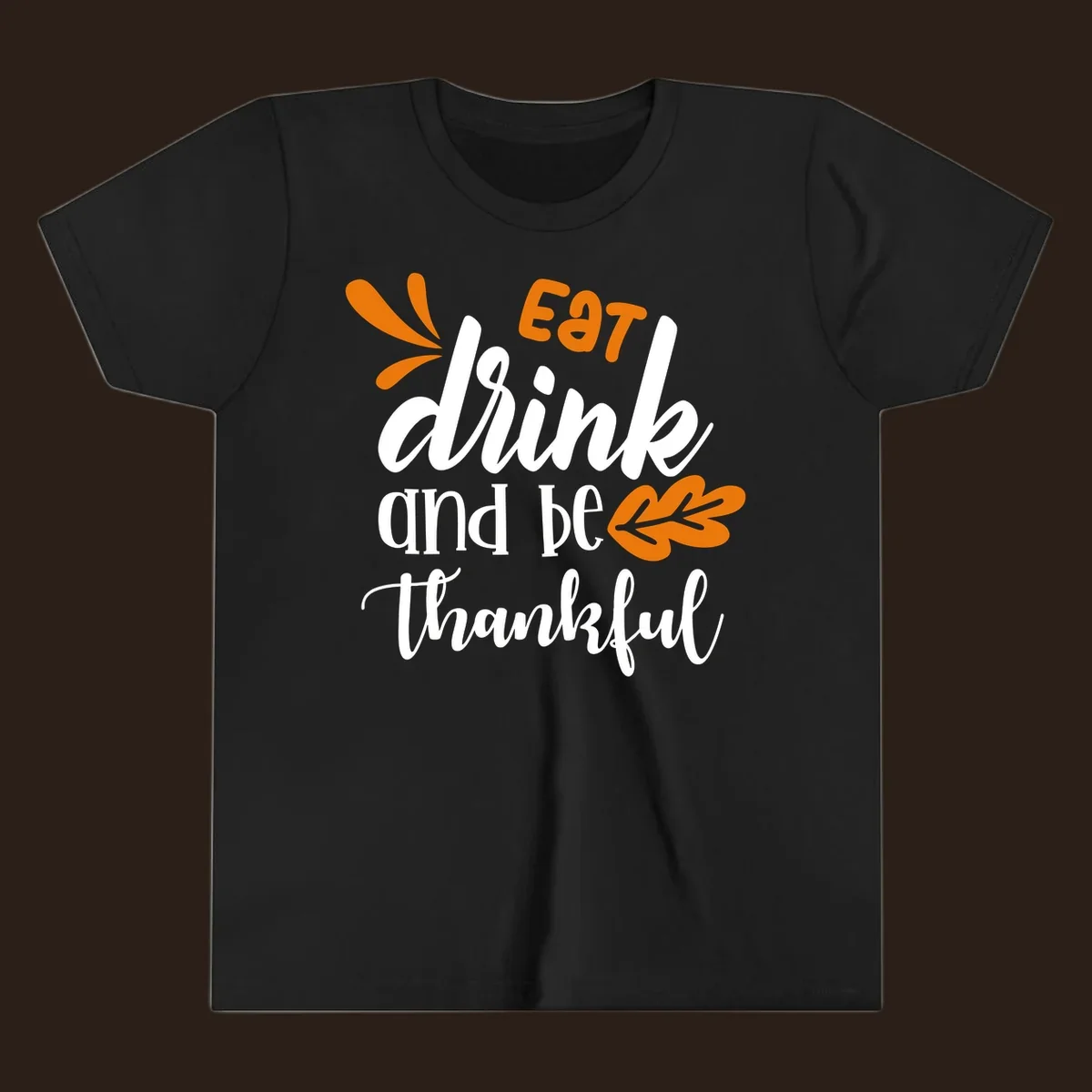 Eat Drink and Be Thankful Thanksgiving text and leaf graphic