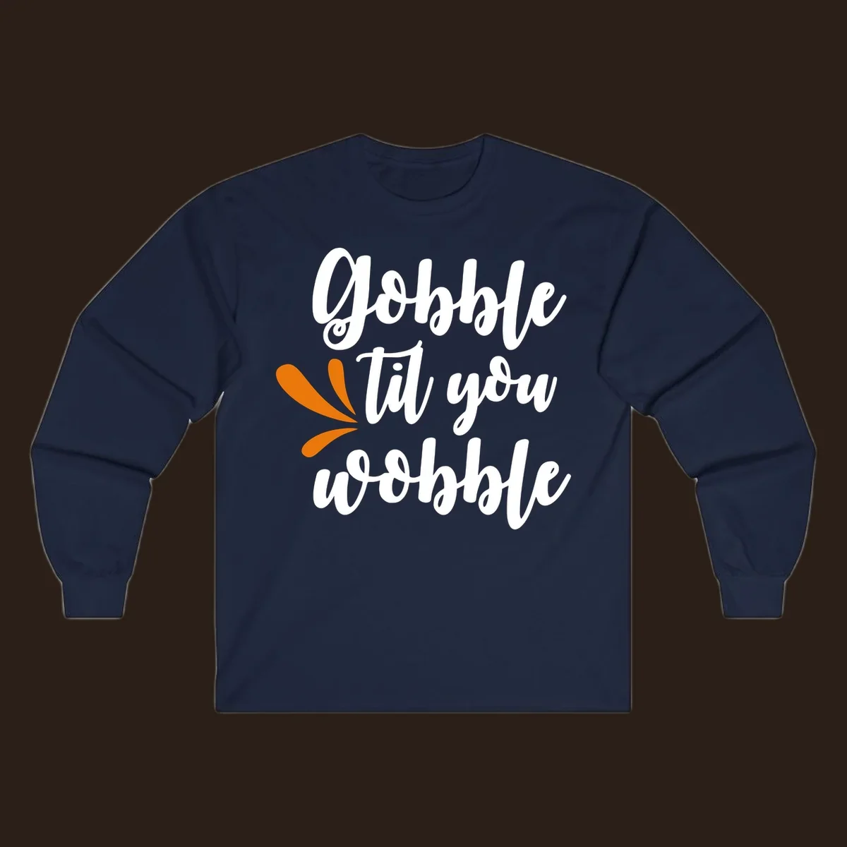 Gobble 'til you wobble Thanksgiving phrase with orange turkey feather illustrations.