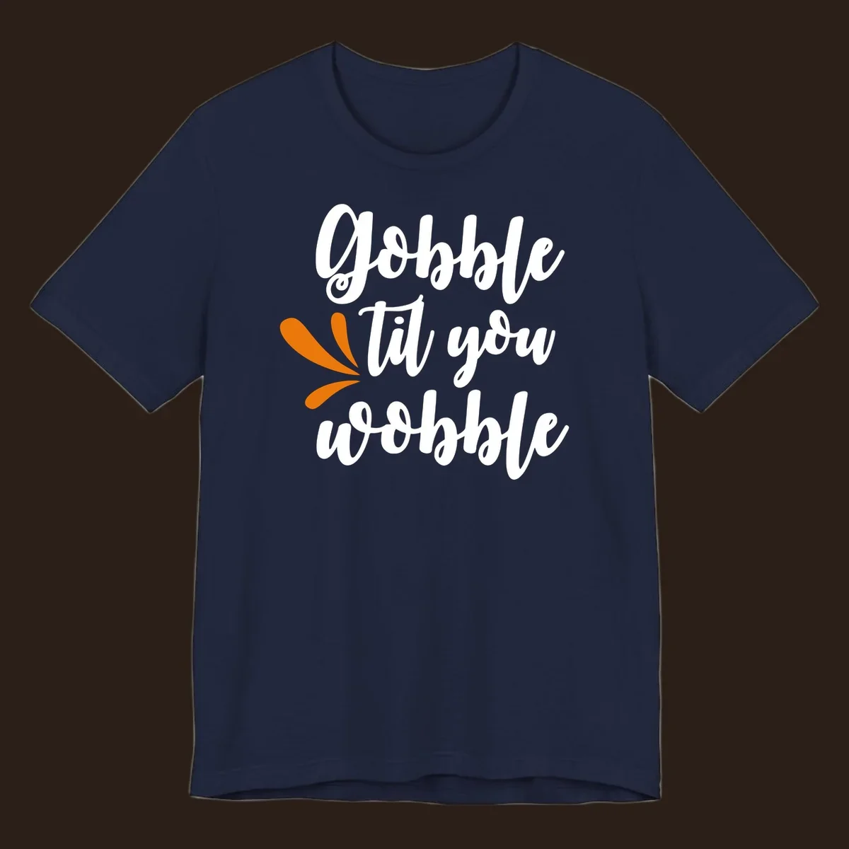 Gobble 'til you wobble Thanksgiving phrase with orange turkey feather illustrations.