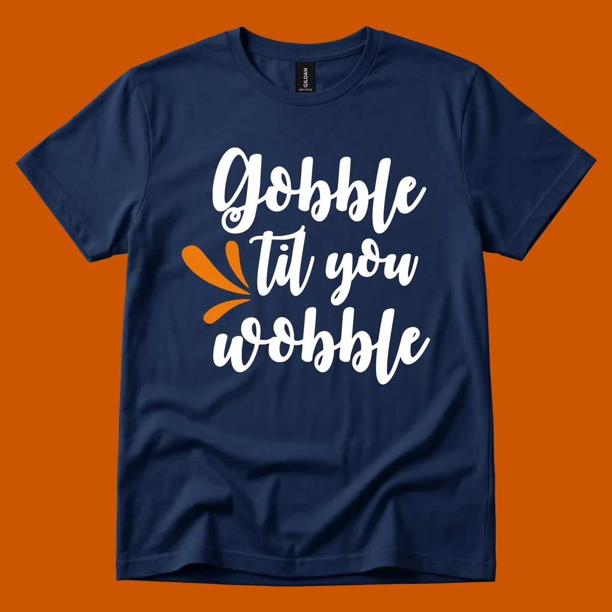Gobble 'til you wobble Thanksgiving phrase with orange turkey feather illustrations.