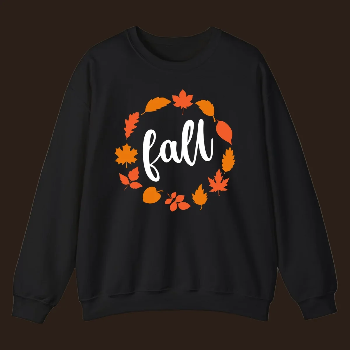 Fall leaves wreath with white script text.