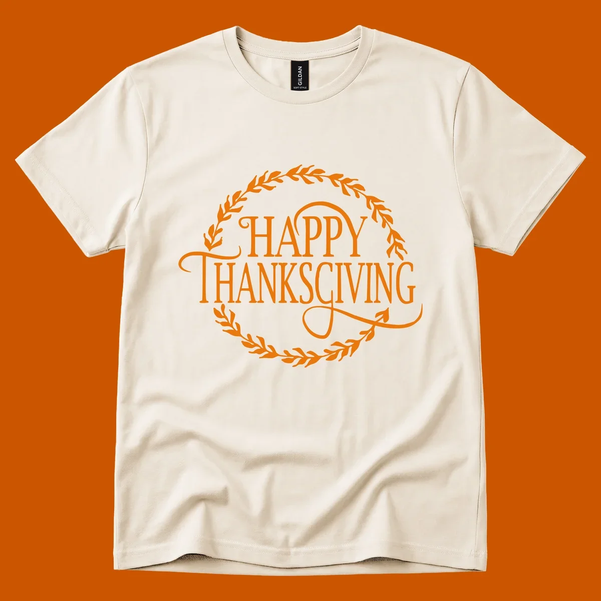 Happy Thanksgiving text with an orange leafy wreath.