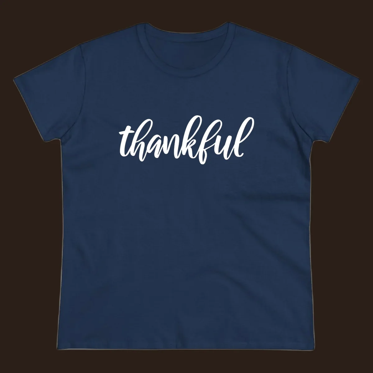 White script text spelling 'thankful' on a black background, representing thankful script word art.