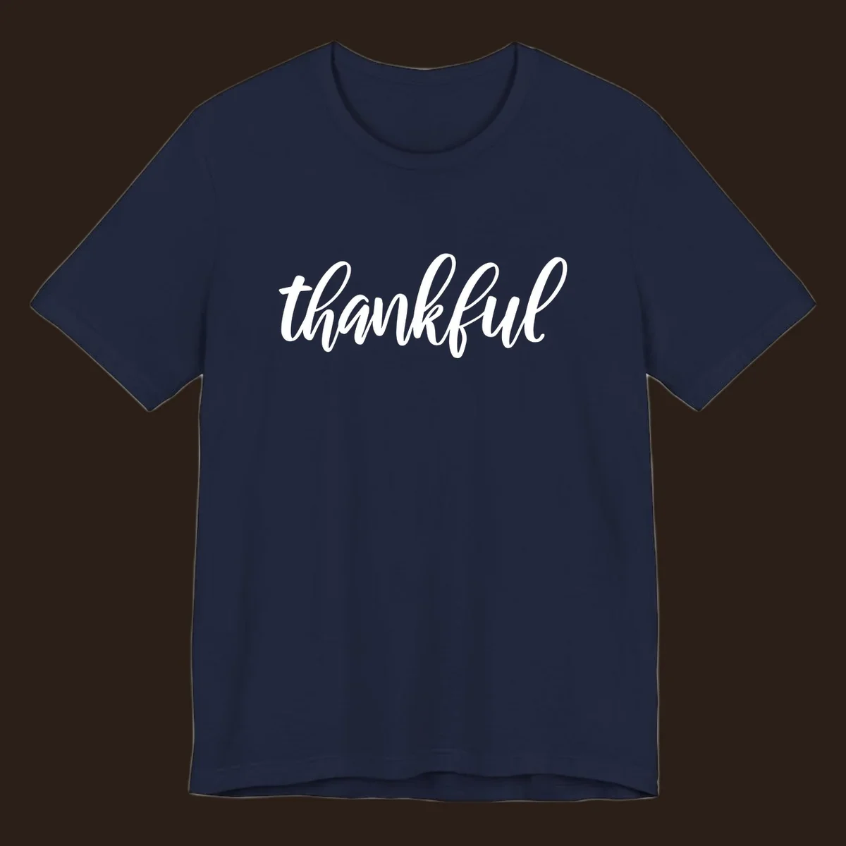 White script text spelling 'thankful' on a black background, representing thankful script word art.