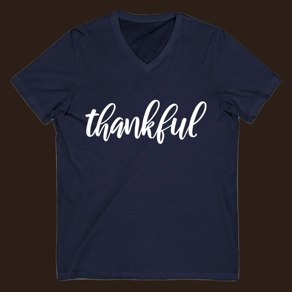 White script text spelling 'thankful' on a black background, representing thankful script word art.