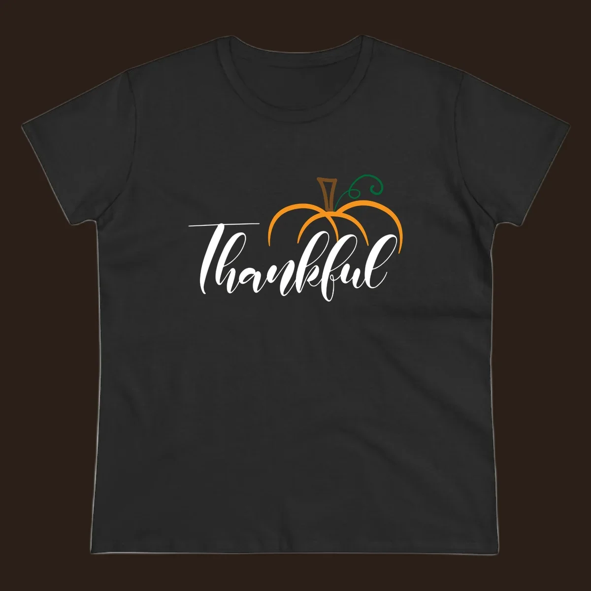 White script text 'Thankful' with a stylized orange pumpkin illustration.
