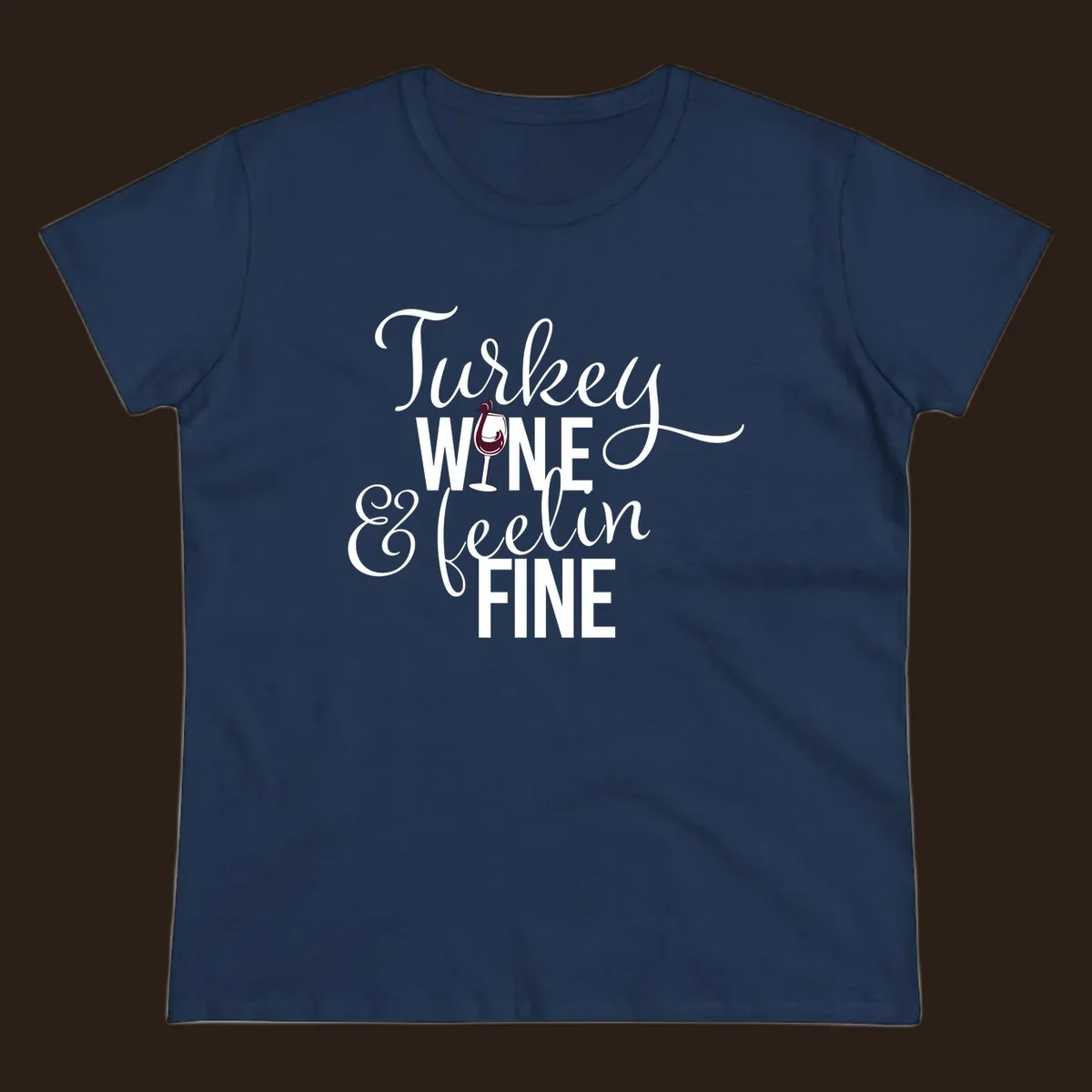 Turkey Wine Feelin Fine Thanksgiving design with text and wine glass illustration.