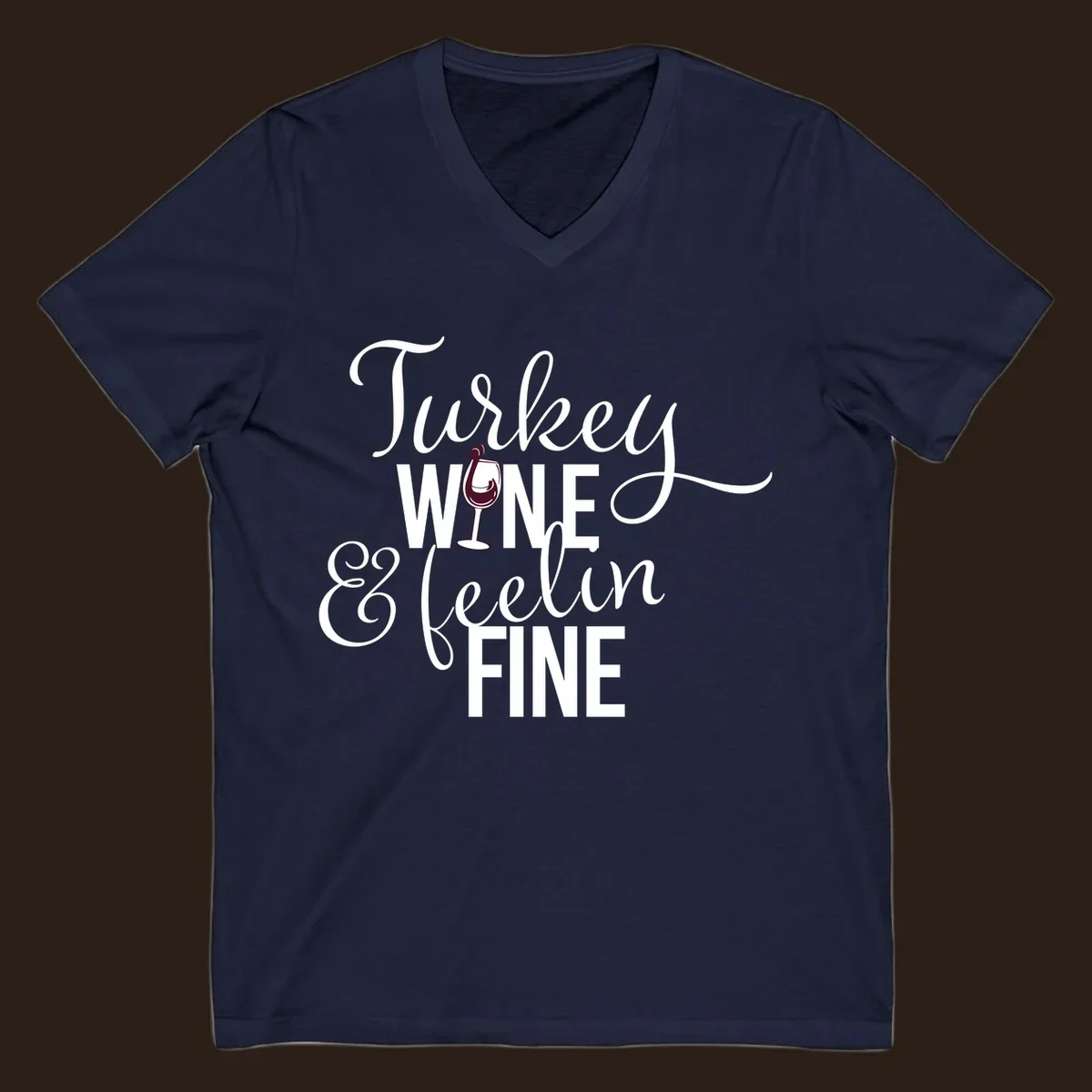 Turkey Wine Feelin Fine Thanksgiving design with text and wine glass illustration.