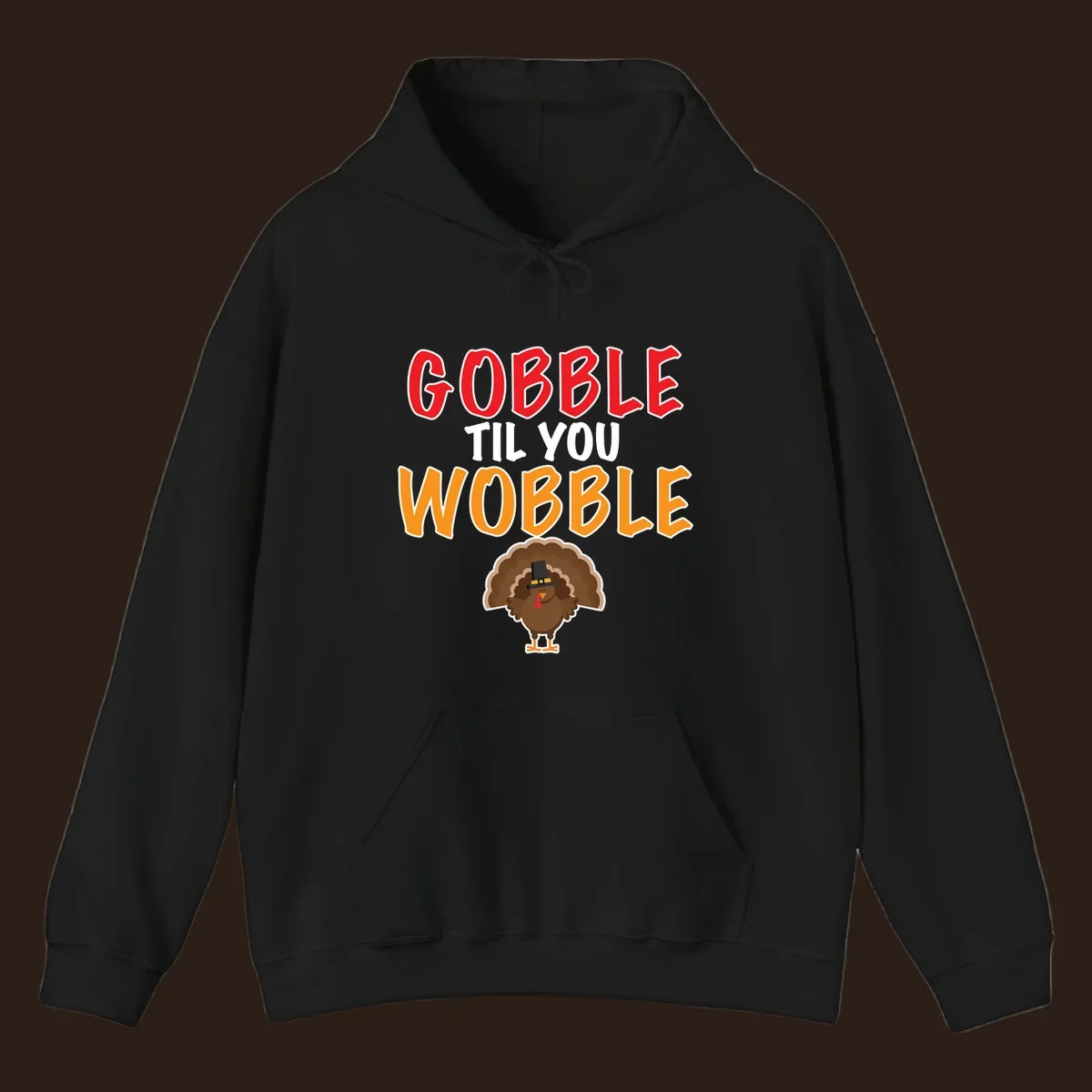 Gobble Til You Wobble text with a cartoon turkey wearing a pilgrim hat.