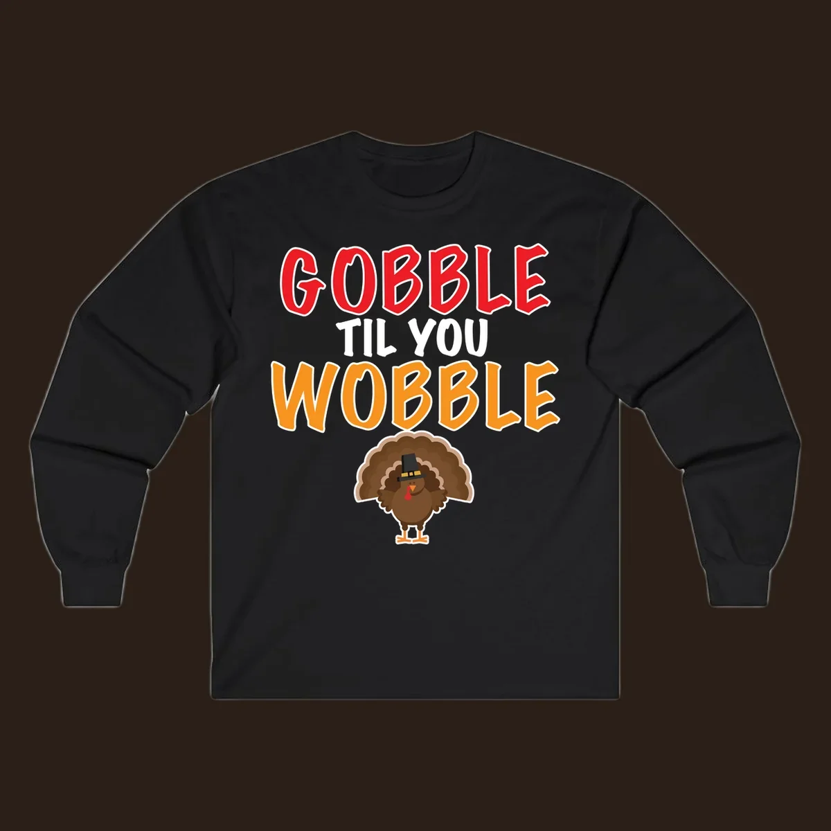 Gobble Til You Wobble text with a cartoon turkey wearing a pilgrim hat.