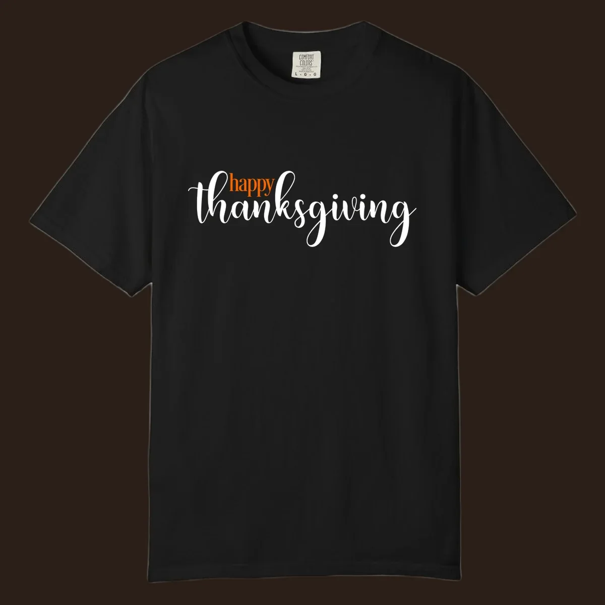 Happy Thanksgiving script design with orange 'happy' and white 'thanksgiving'.