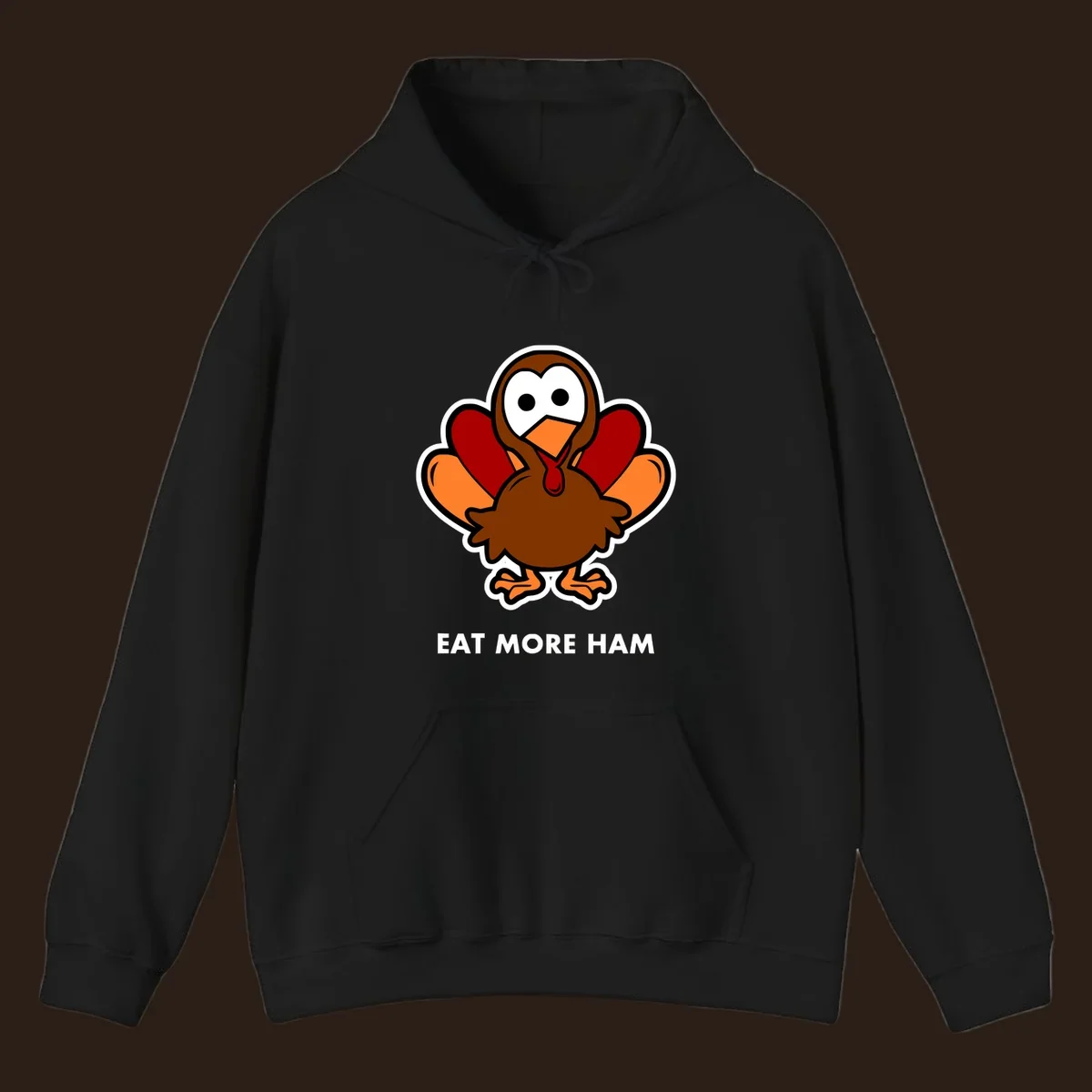 Cartoon turkey with 'Eat More Ham' text, promoting a fun Thanksgiving alternative.