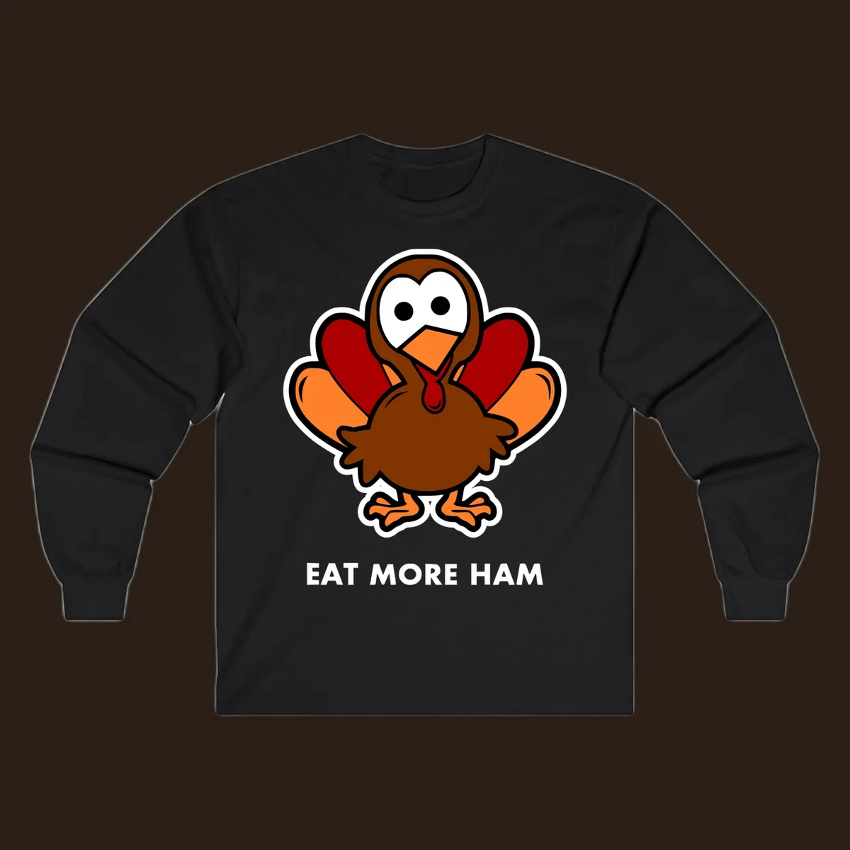 Cartoon turkey with 'Eat More Ham' text, promoting a fun Thanksgiving alternative.