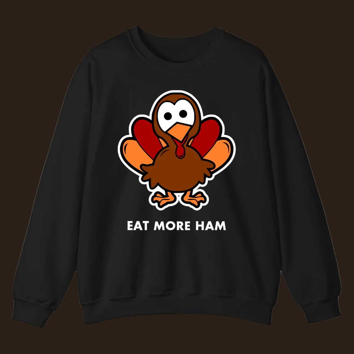 Cartoon turkey with 'Eat More Ham' text, promoting a fun Thanksgiving alternative.