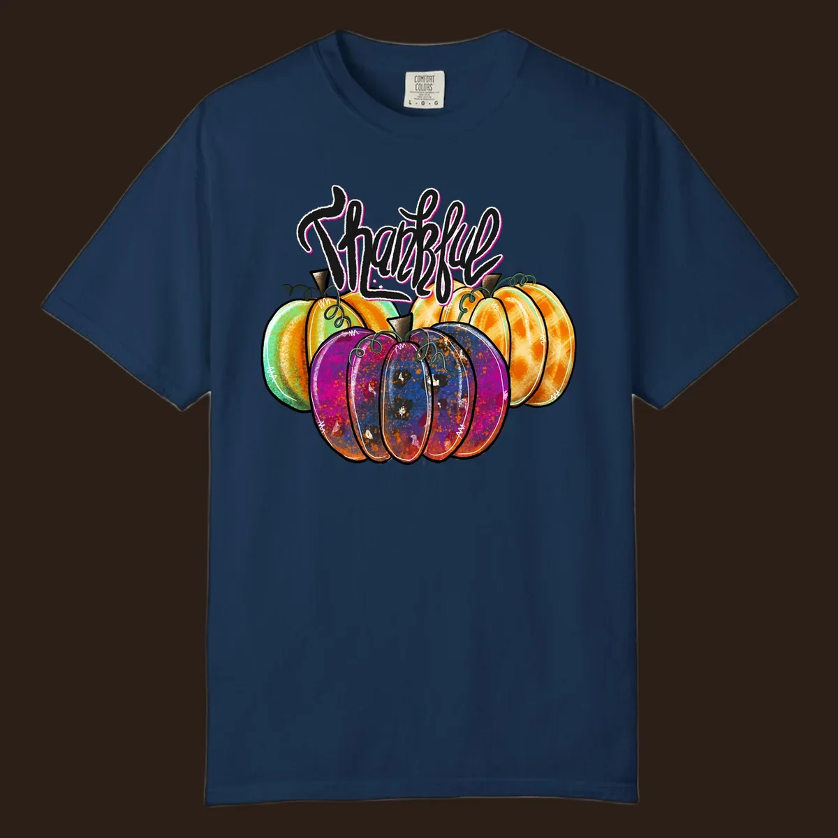 Fall pumpkin patch thankful script design. Colorful pumpkins with text.