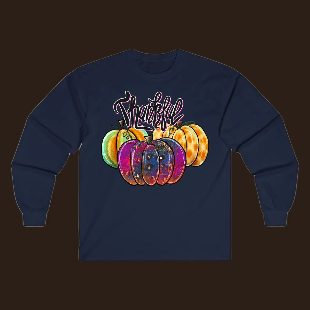 Fall pumpkin patch thankful script design. Colorful pumpkins with text.