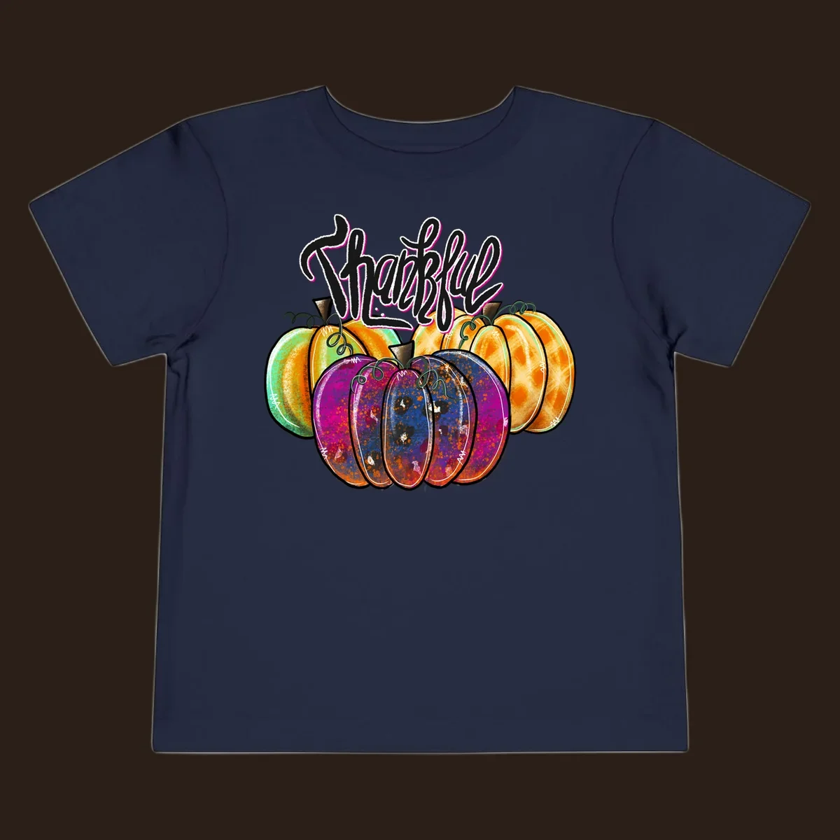 Fall pumpkin patch thankful script design. Colorful pumpkins with text.