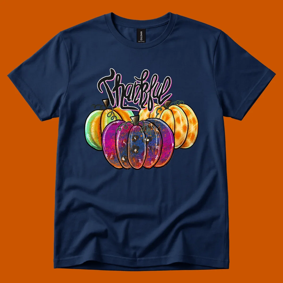Fall pumpkin patch thankful script design. Colorful pumpkins with text.