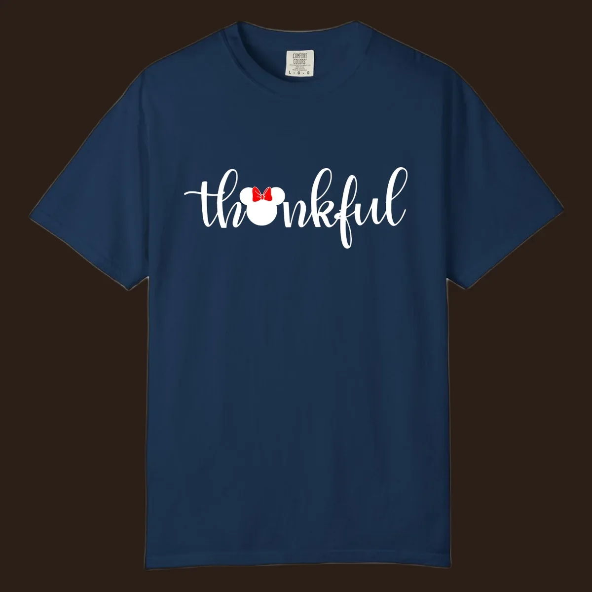 Minnie Mouse silhouette replaces the 'o' in the word 'thankful' in a script font.