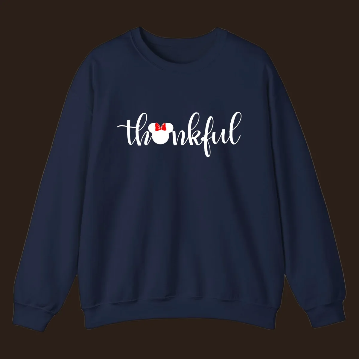 Minnie Mouse silhouette replaces the 'o' in the word 'thankful' in a script font.