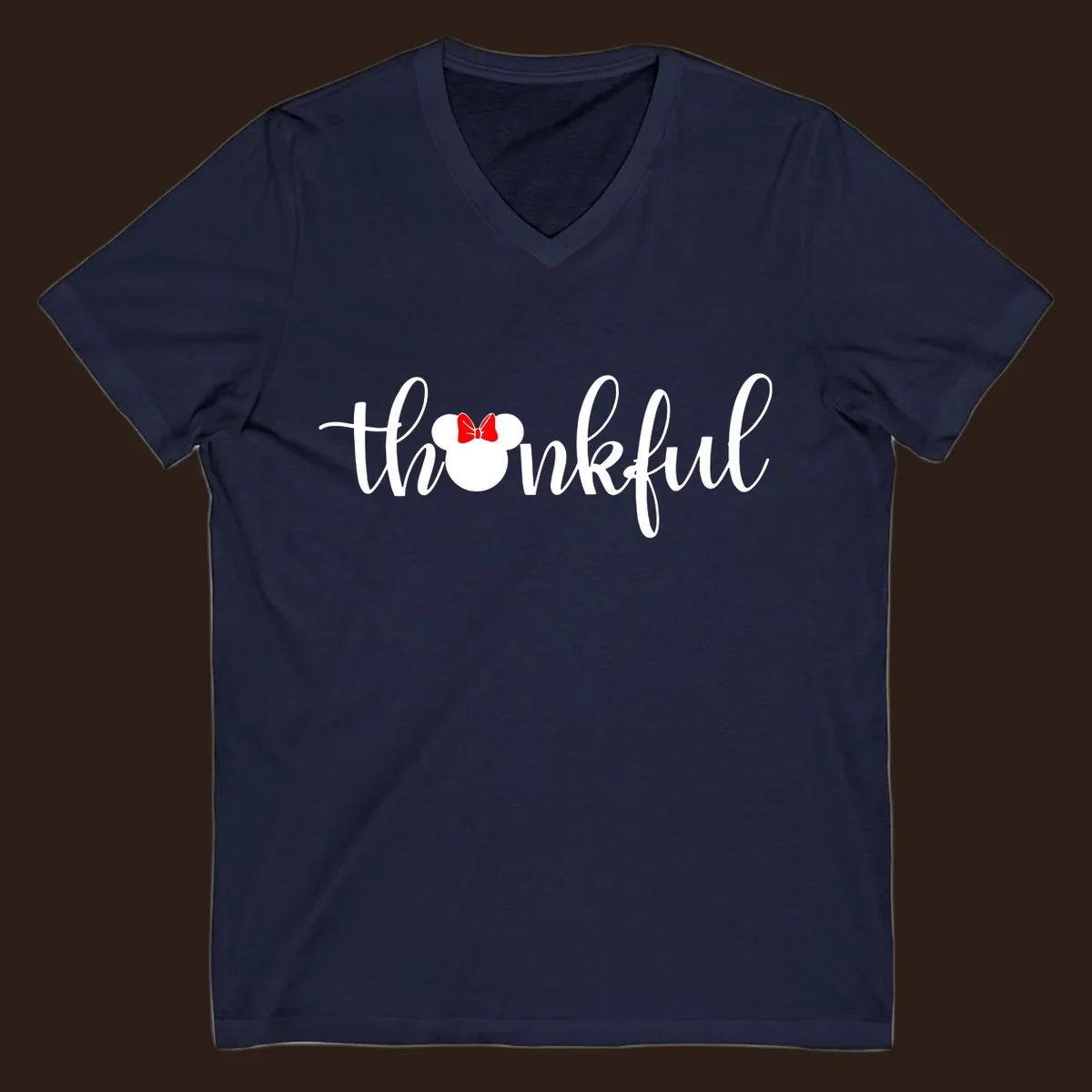 Minnie Mouse silhouette replaces the 'o' in the word 'thankful' in a script font.