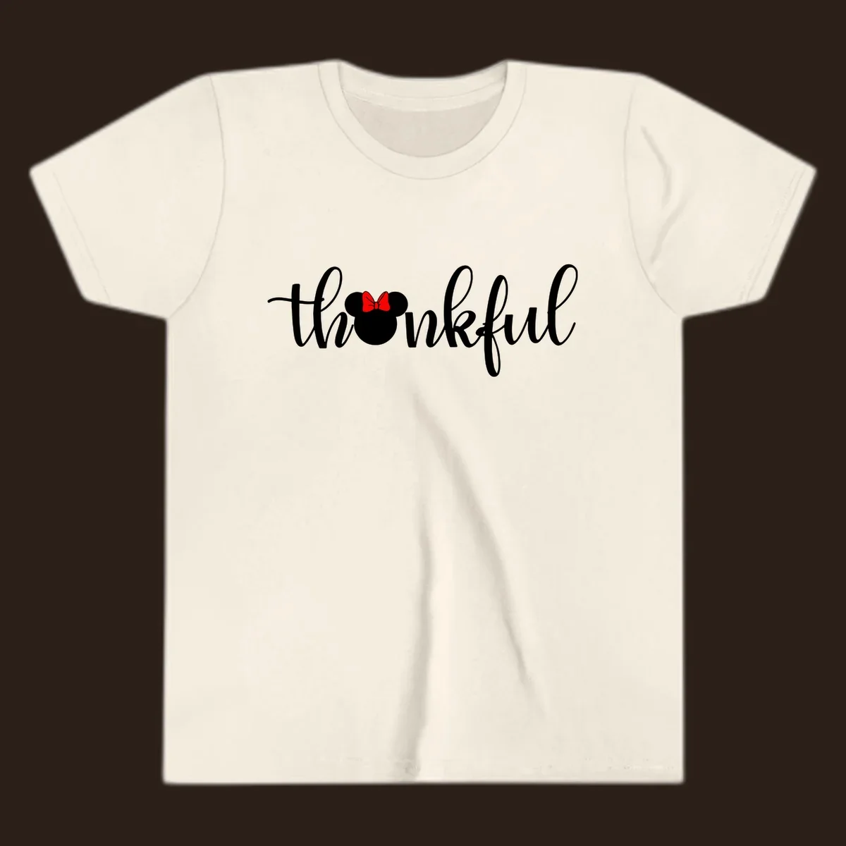 Minnie Mouse silhouette replaces the 'o' in the word 'thankful' in a script font.