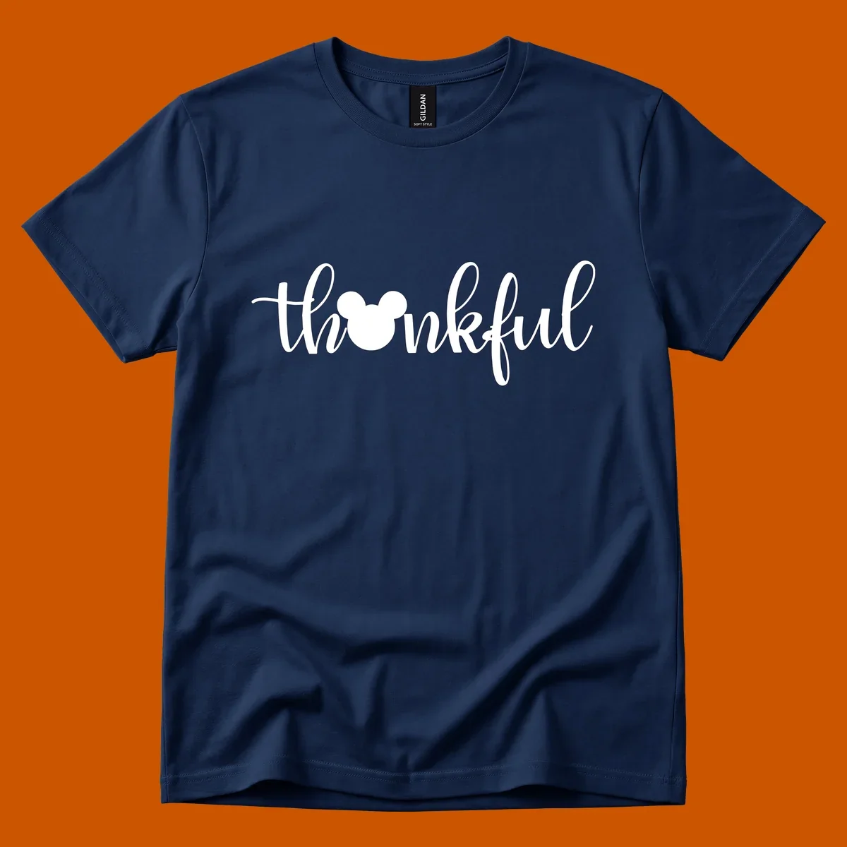 Script text 'thankful' with Mickey Mouse head silhouette replacing the 'o', in white and black variants.