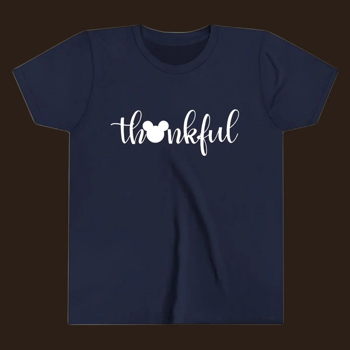 Script text 'thankful' with Mickey Mouse head silhouette replacing the 'o', in white and black variants.