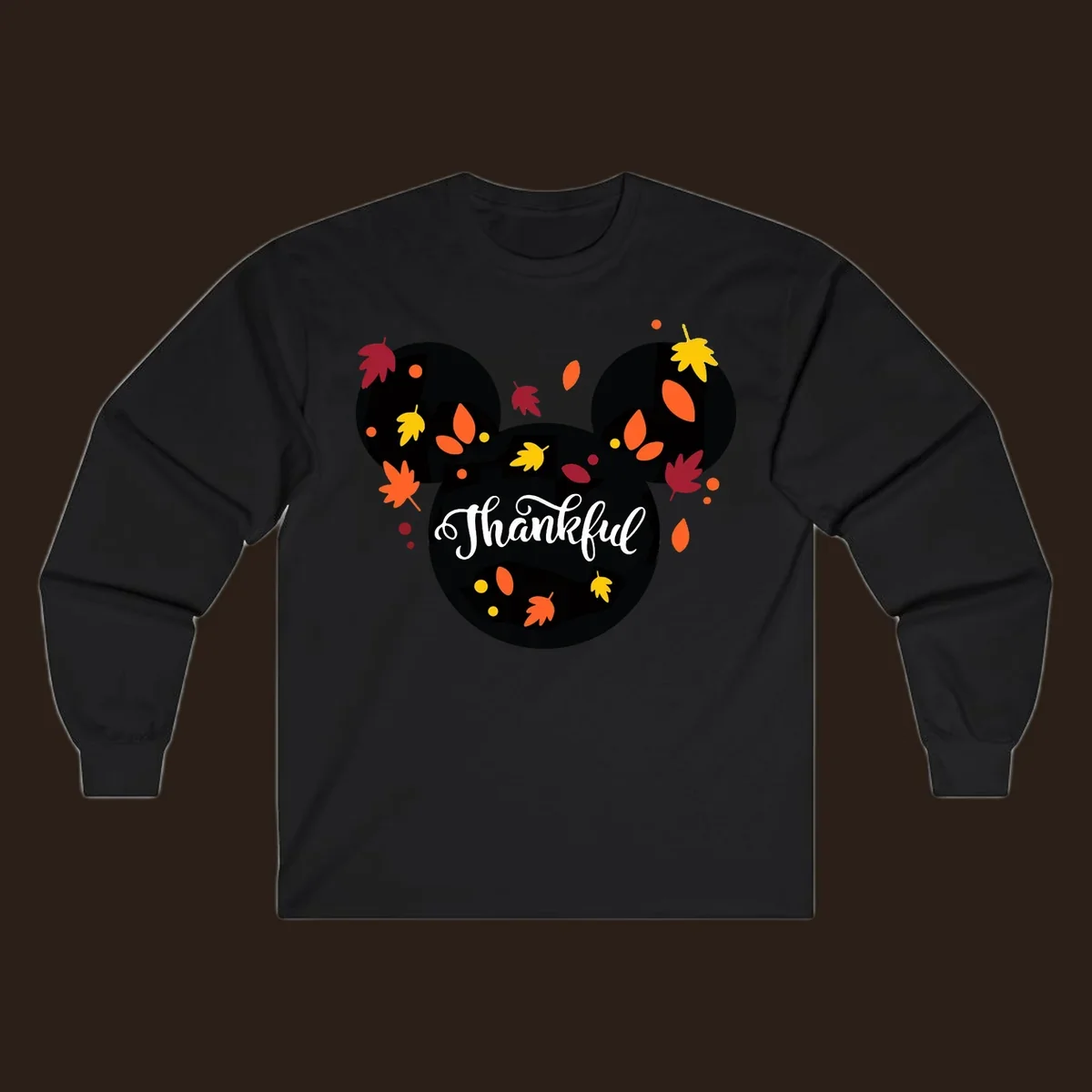 Mickey mouse head silhouette with 'Thankful' text and fall leaves, for thanksgiving shirts.