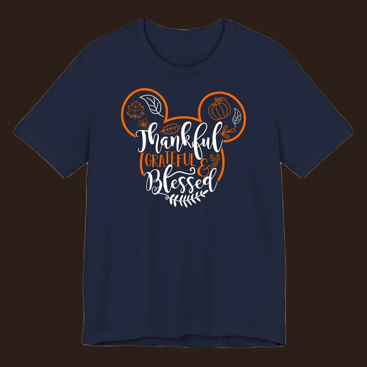 Thanksgiving Mickey Mouse head design with text Thankful GRATEFUL & Blessed and fall icons.