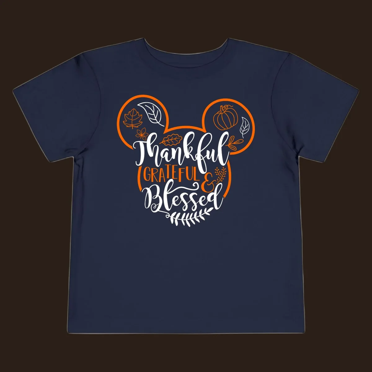 Thanksgiving Mickey Mouse head design with text Thankful GRATEFUL & Blessed and fall icons.