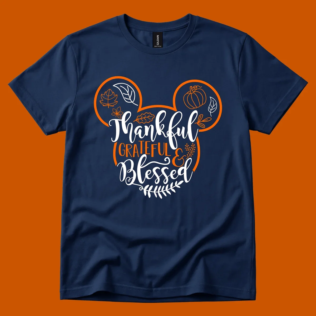 Thanksgiving Mickey Mouse head design with text Thankful GRATEFUL & Blessed and fall icons.