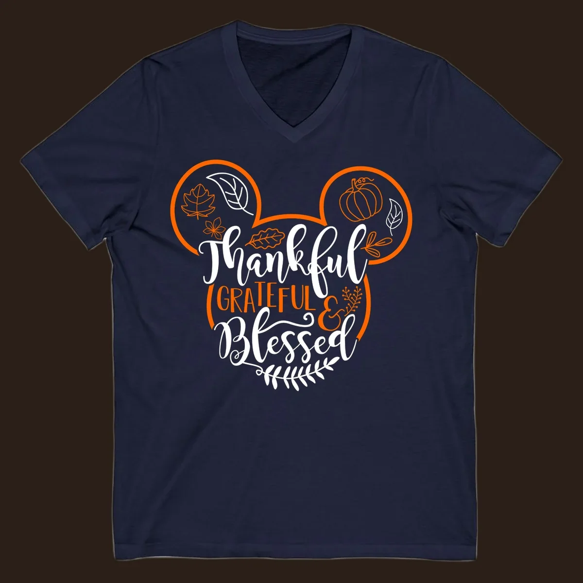 Thanksgiving Mickey Mouse head design with text Thankful GRATEFUL & Blessed and fall icons.
