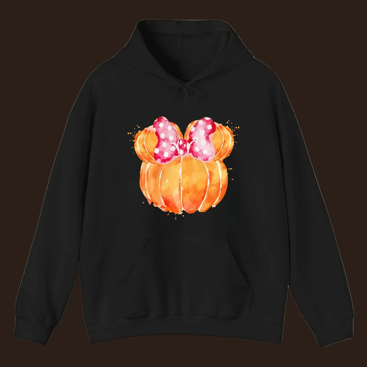 Watercolor illustration of two orange pumpkins shaped like Minnie Mouse ears with a pink polka dot bow.