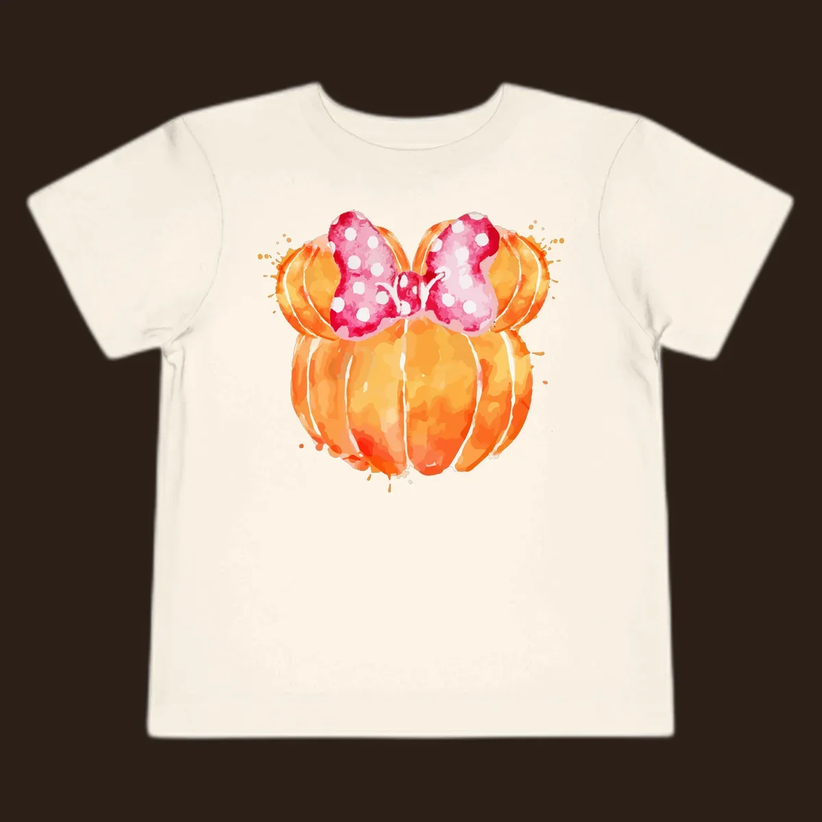 Watercolor illustration of two orange pumpkins shaped like Minnie Mouse ears with a pink polka dot bow.