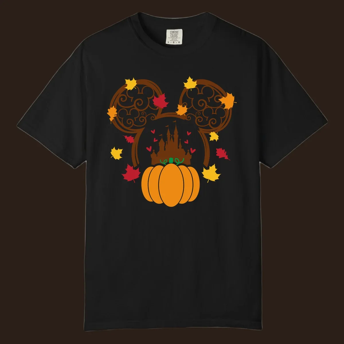 Disney fall pumpkin castle Mickey ears design with autumn leaves.