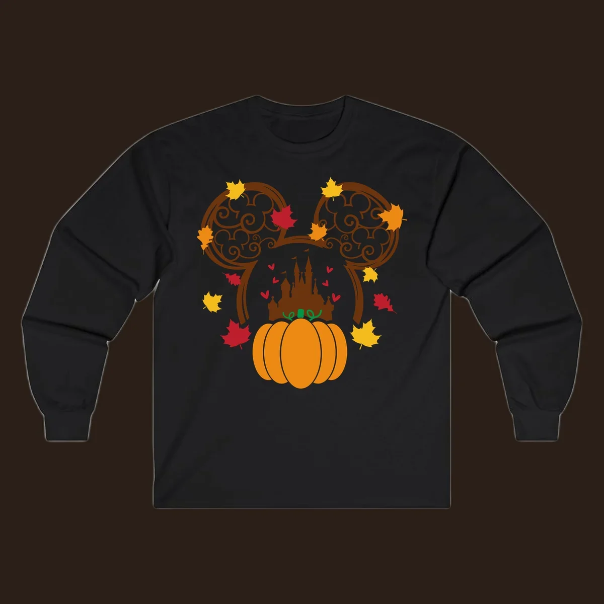 Disney fall pumpkin castle Mickey ears design with autumn leaves.