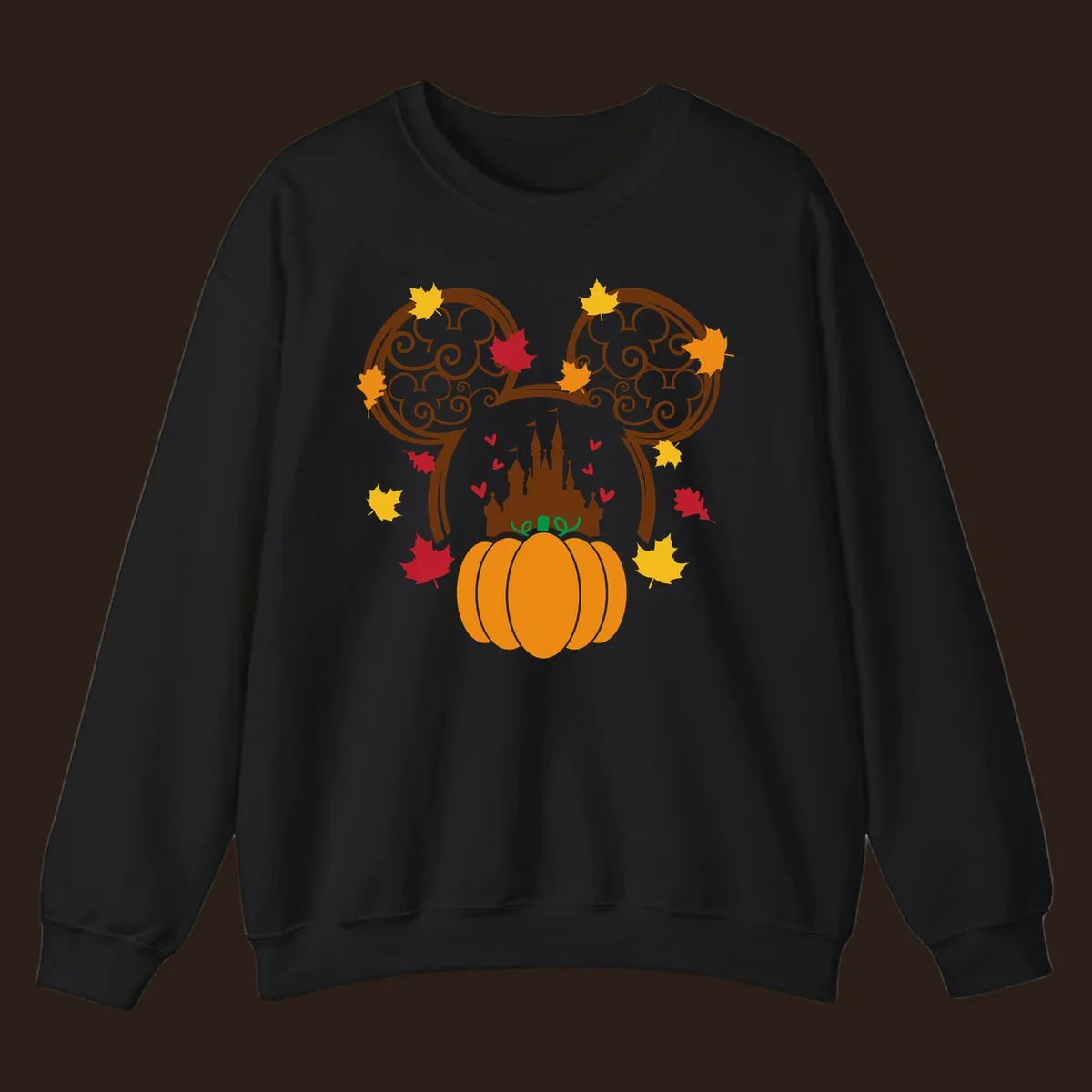 Disney fall pumpkin castle Mickey ears design with autumn leaves.