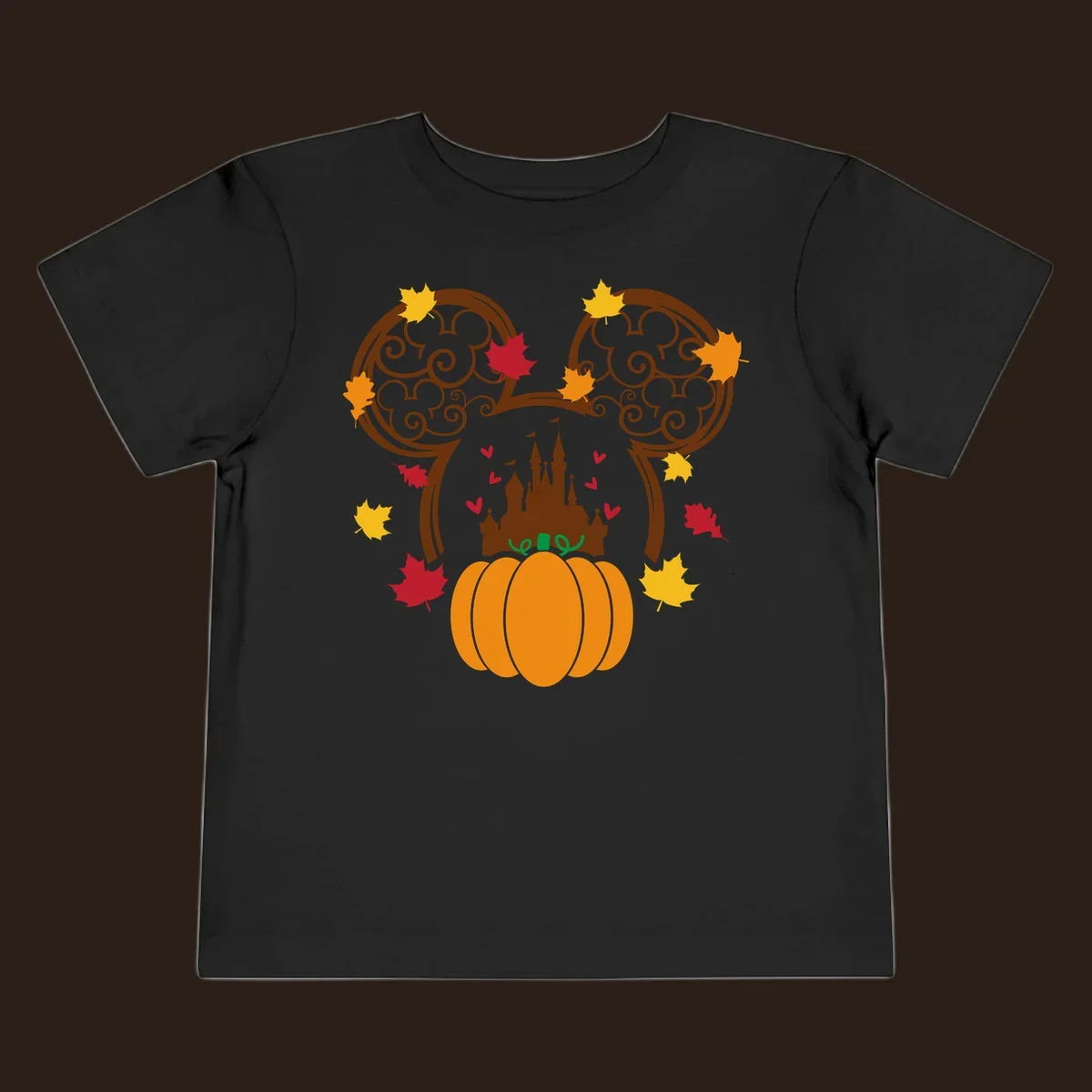 Disney fall pumpkin castle Mickey ears design with autumn leaves.
