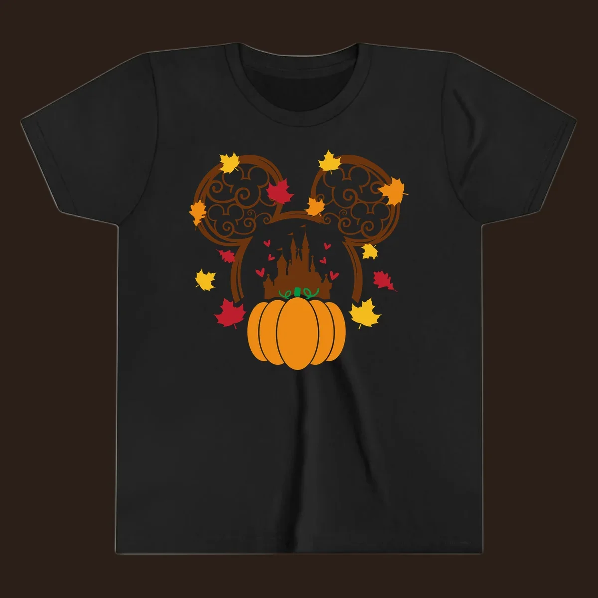 Disney fall pumpkin castle Mickey ears design with autumn leaves.