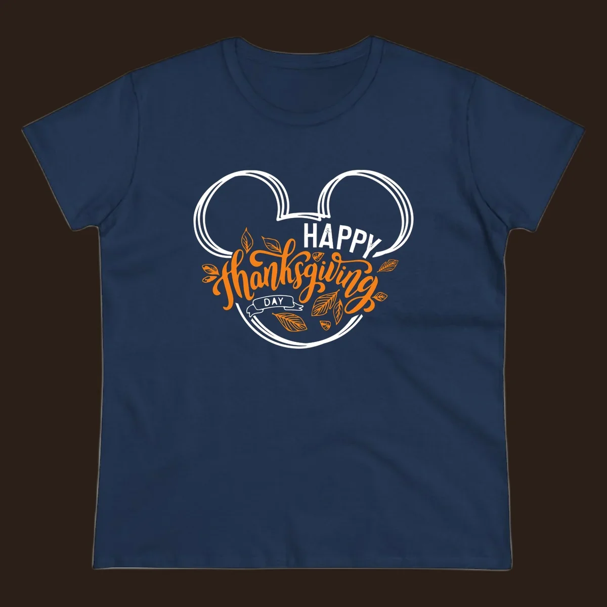 Happy Thanksgiving Day text with Mickey Mouse ears and fall leaves.