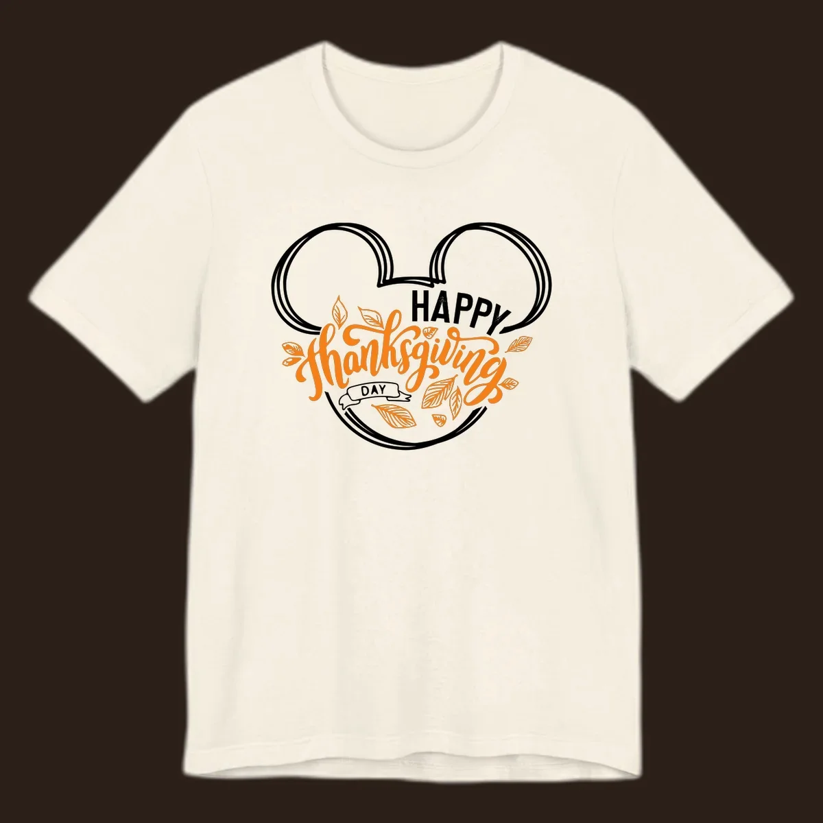Happy Thanksgiving Day text with Mickey Mouse ears and fall leaves.