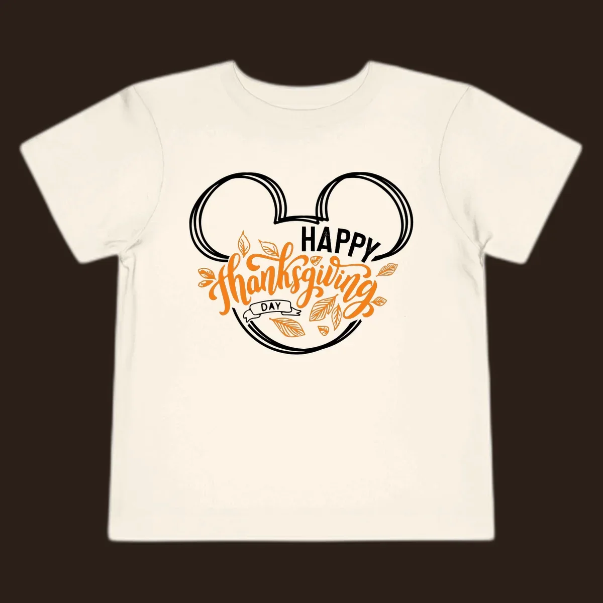 Happy Thanksgiving Day text with Mickey Mouse ears and fall leaves.