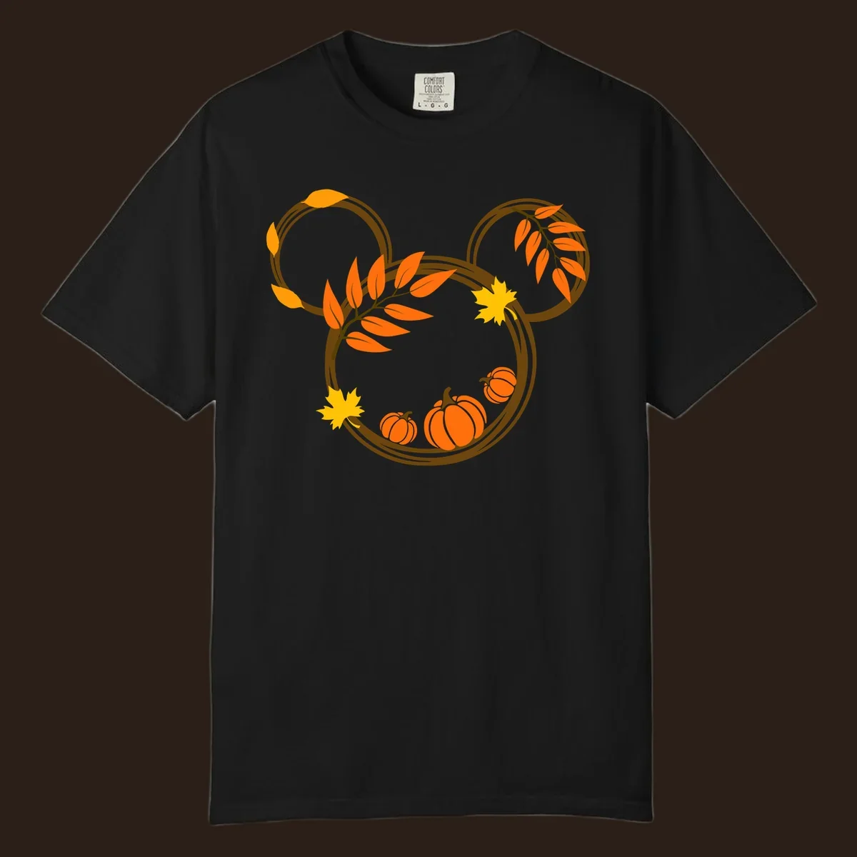 Mickey autumn leaves and pumpkins graphic with branches and pumpkins.